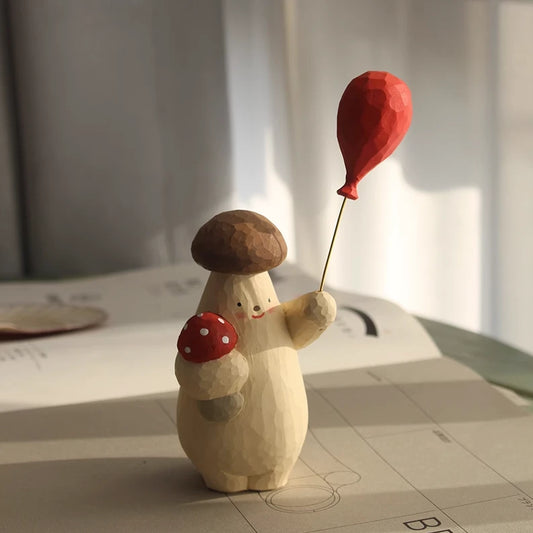 Whimsical hand-carved wooden mushroom character figurine for shelf decor